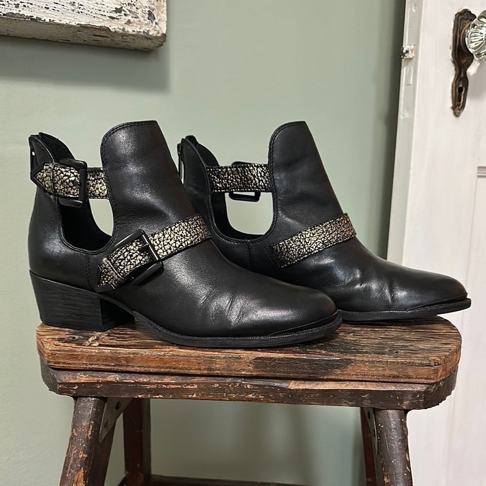 Elliott Lucca Rafaella Black Leather Cutout Moto Ankle Boots with Gold Accents
